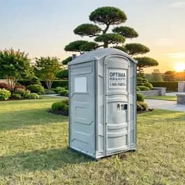 Portable restroom units staged for weekly service